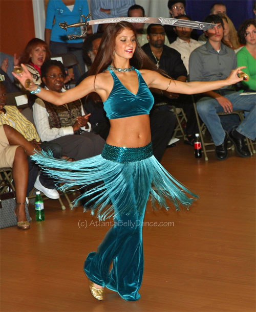 Belly dancer with sword perform sword dance. Atlanta Belly Dance 2020